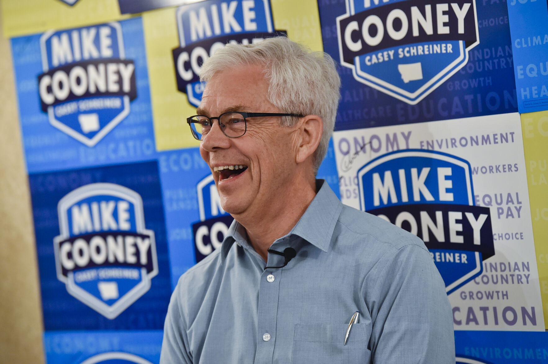 Democratic candidiate for governor Mike Cooney talks with a reporter Tuesday night